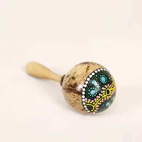 Shaker coquille de coco motifs